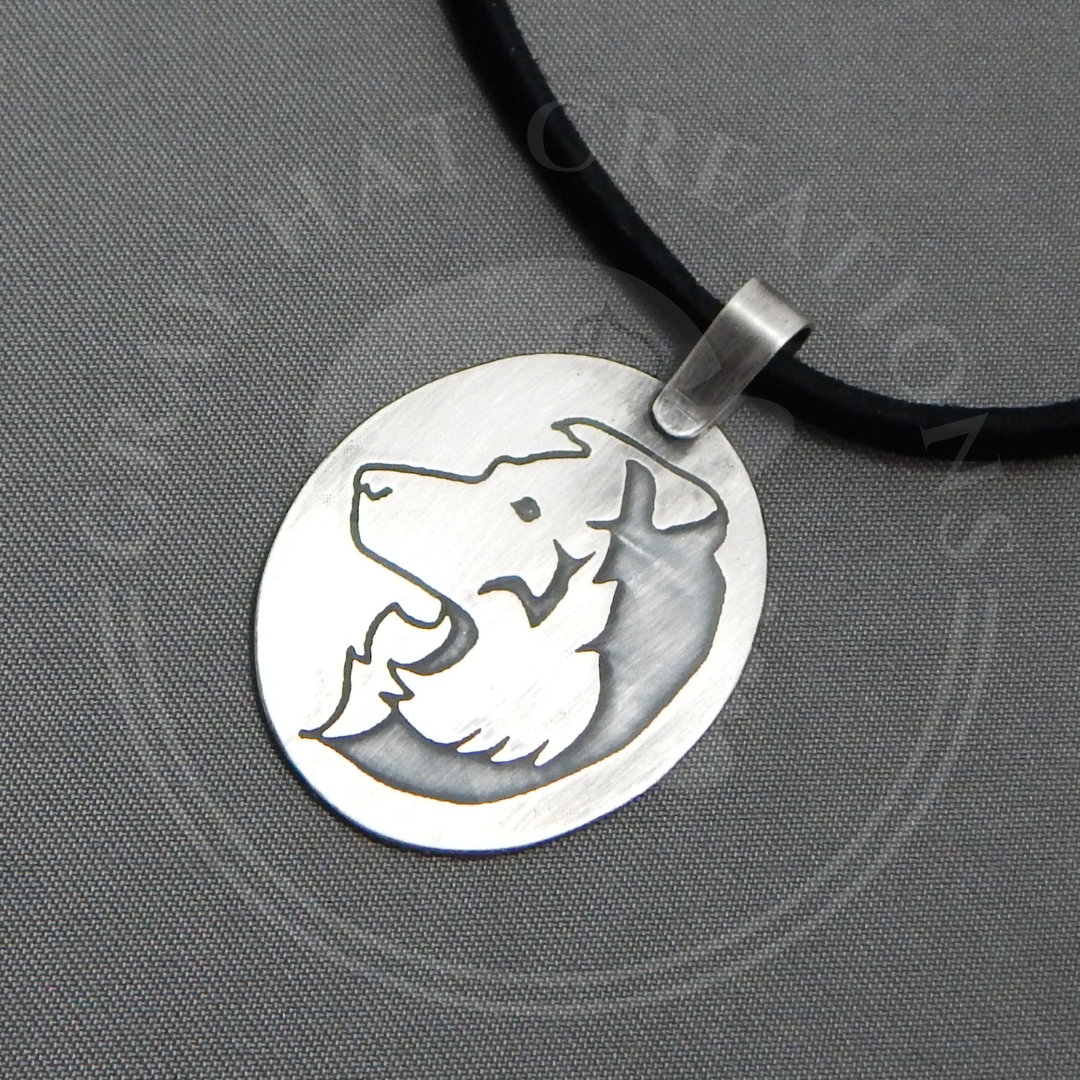 Custom etched dog pendant drawn from photo