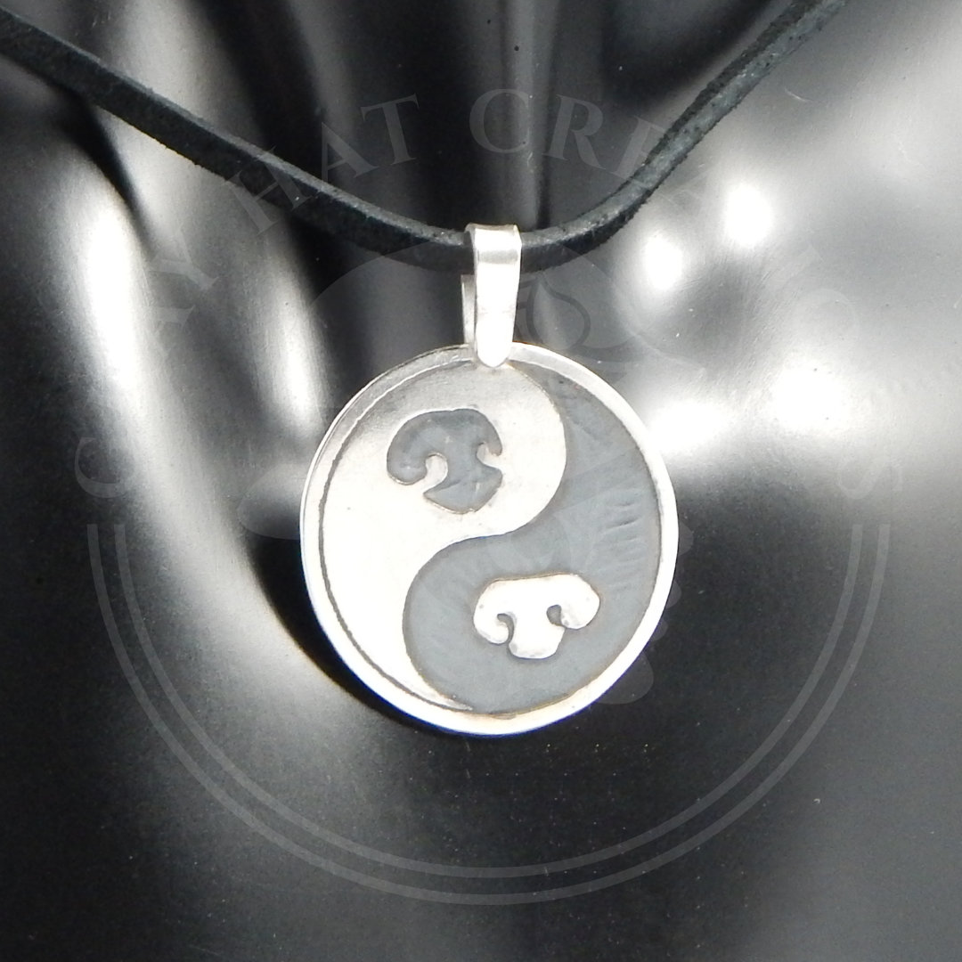 Custom yin and yang pendant with dog nose illustrations from client photo